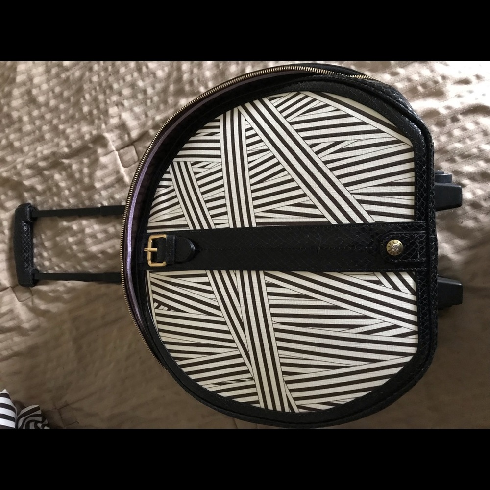 Henri Bendel suitcase with wheels